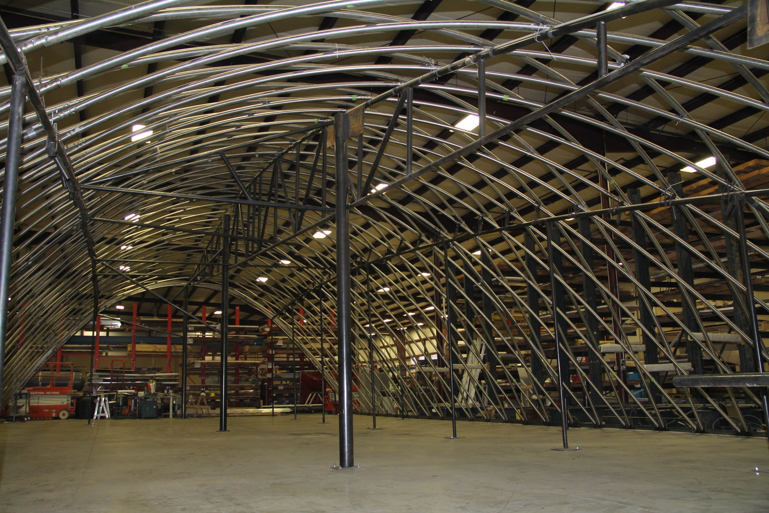 Stainless steel parabolic lattice for the Orrin G. Hatch U.S. Courthouse, assembled full size on the Mid-Am shop floor