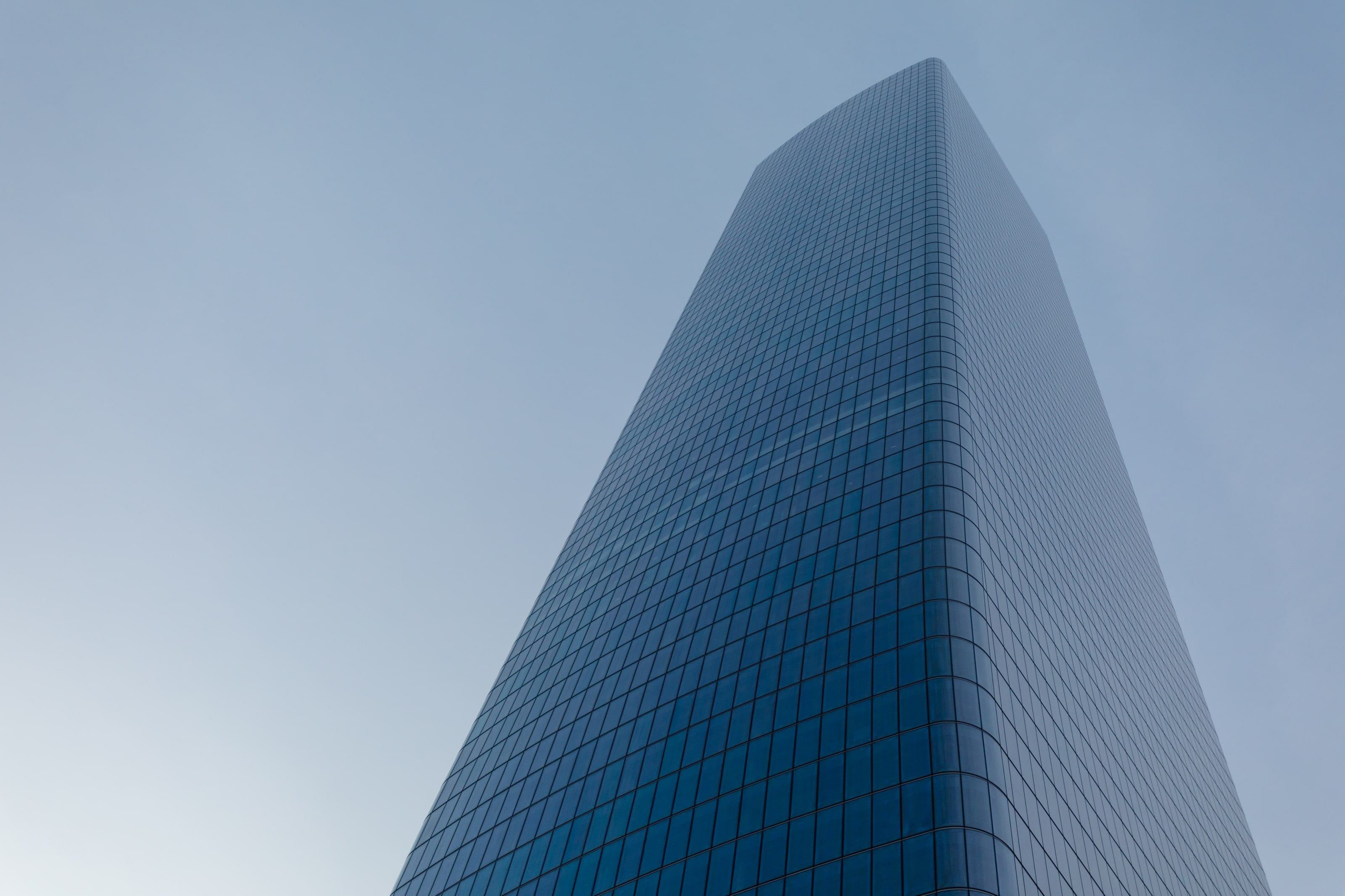 One of the Manhattan West towers rising into a hazy sky