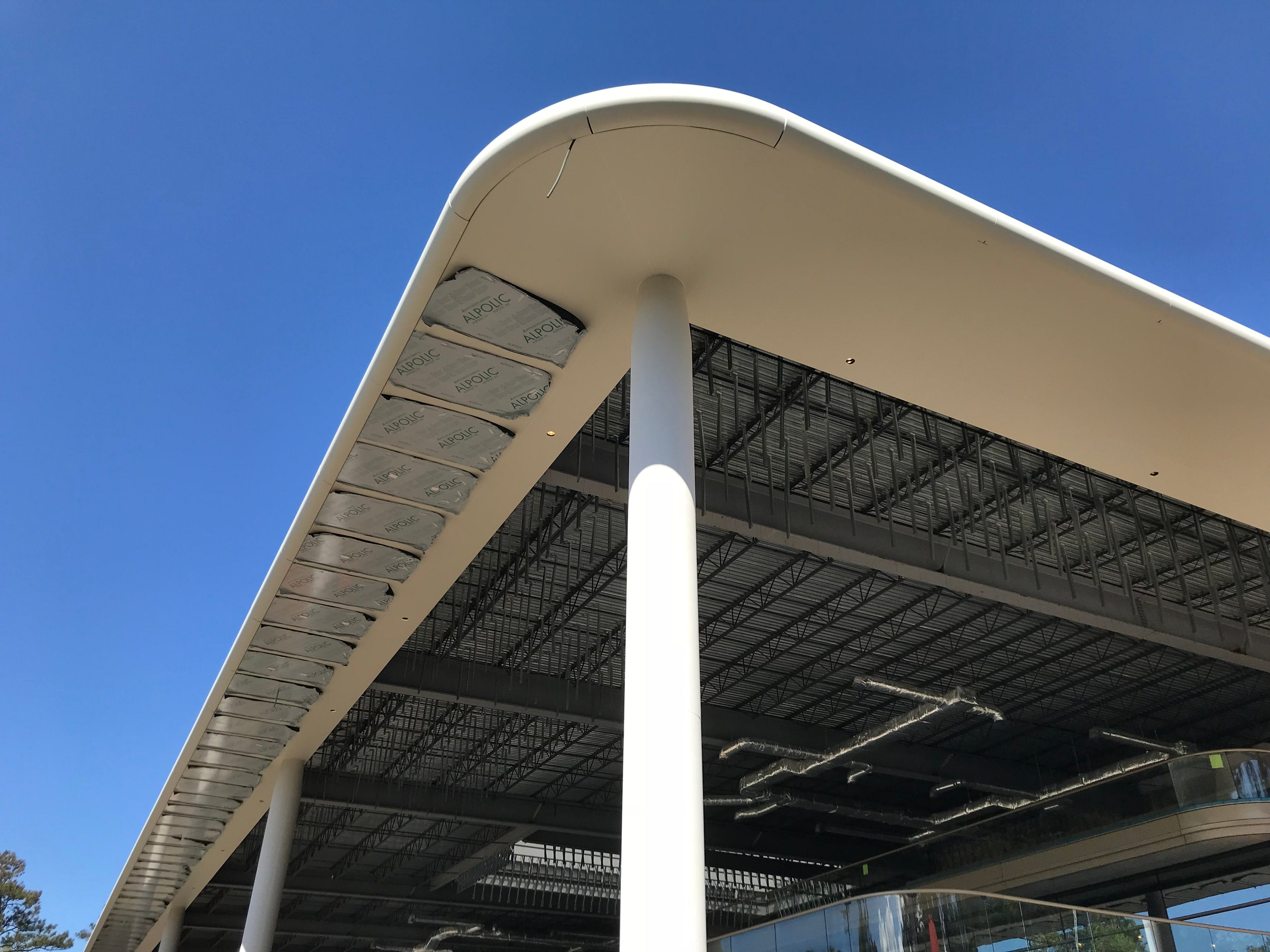 Underside of the curved canopy edge at PGA Tour Headquarters during construction