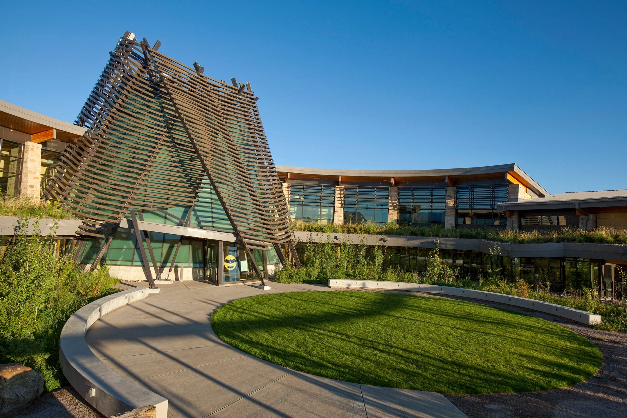 Southern Ute Cultural Center's conical slatted tower beside the circular lawn