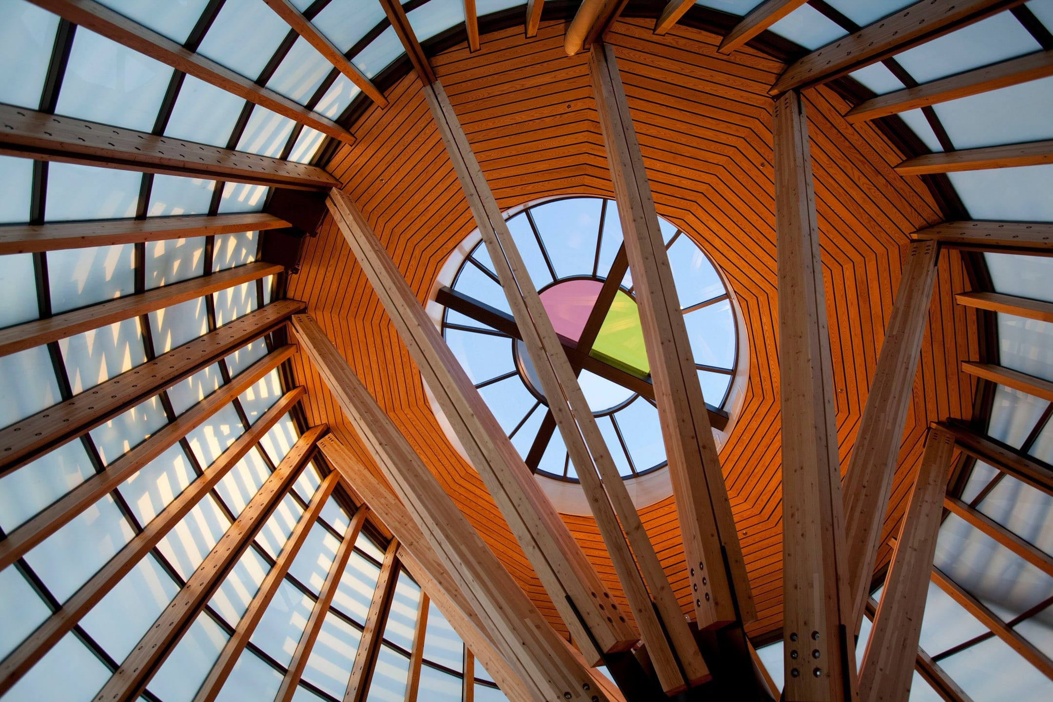 Looking up inside the Southern Ute Cultural Center's timber-framed skylight