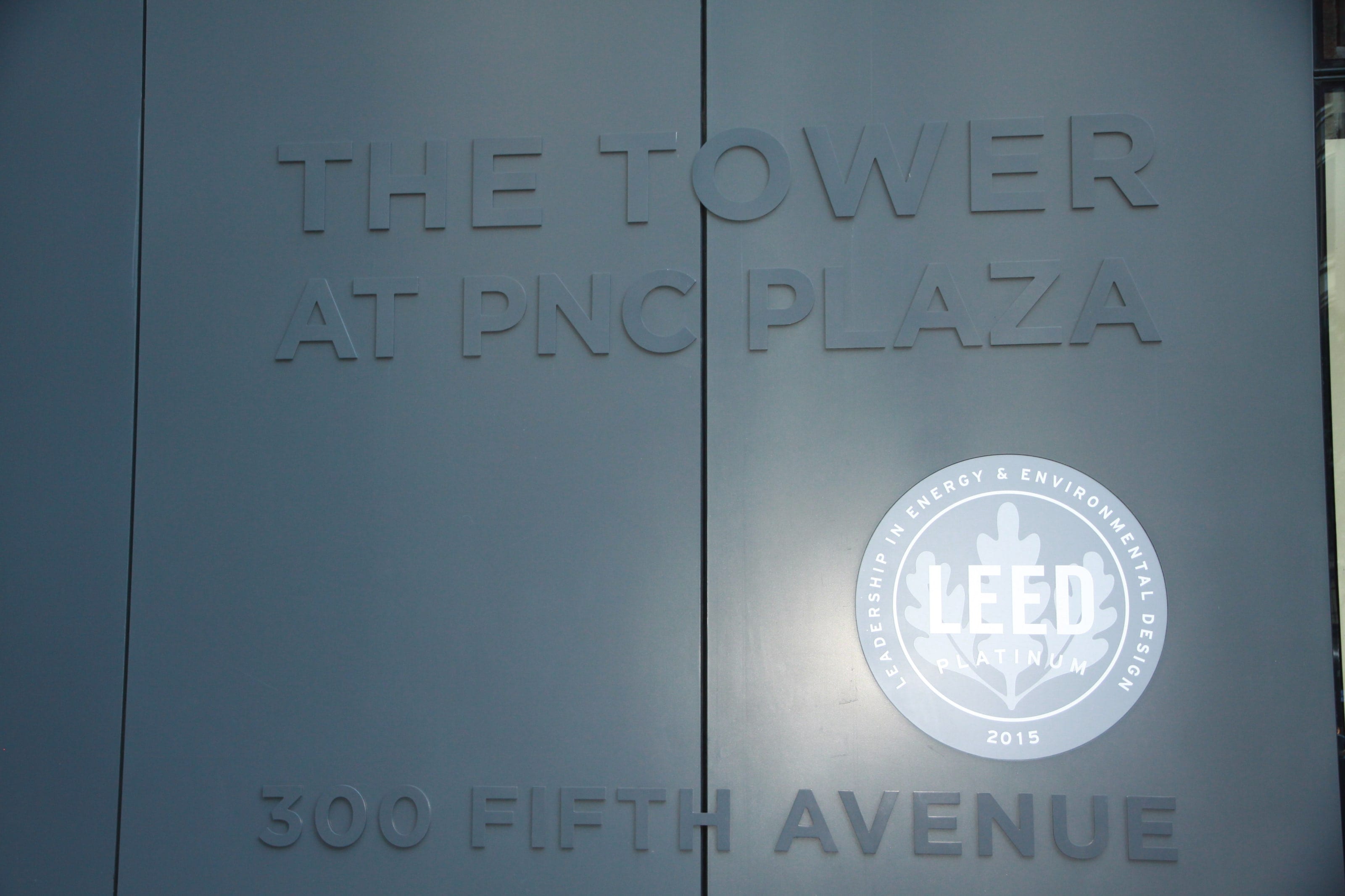 "The Tower at PNC Plaza, 300 Fifth Avenue" sign with its LEED plaque