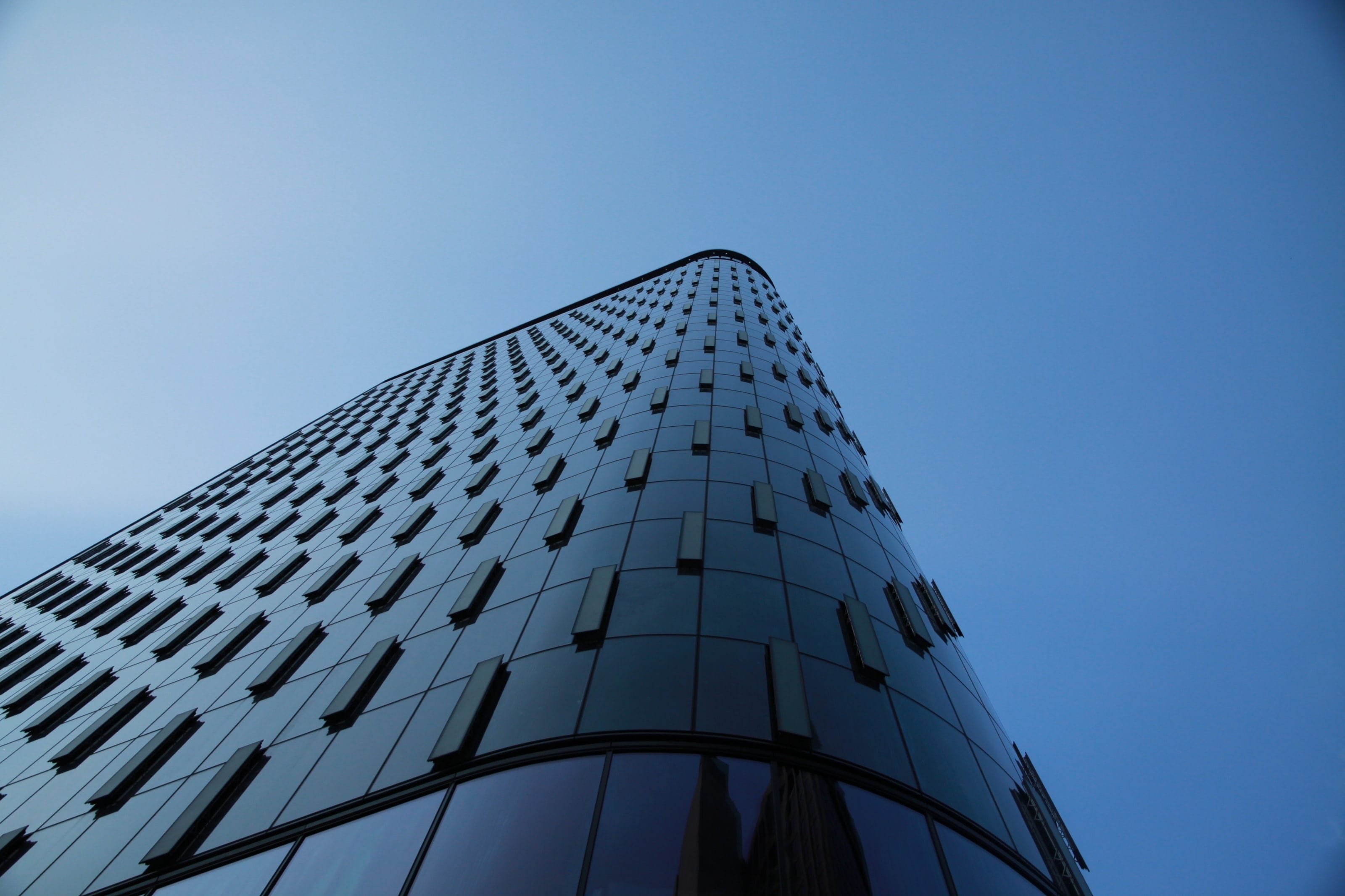Patterned double-skin façade curving around the Tower at PNC Plaza