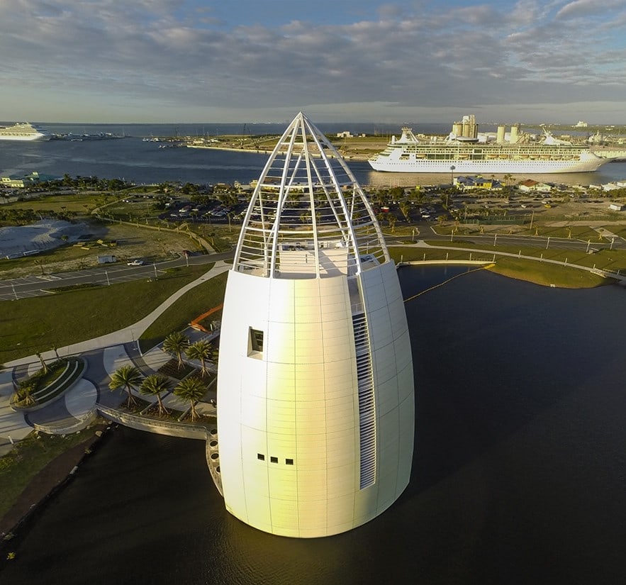 Exploration Tower at Port Canaveral from above, with cruise ships in the harbor