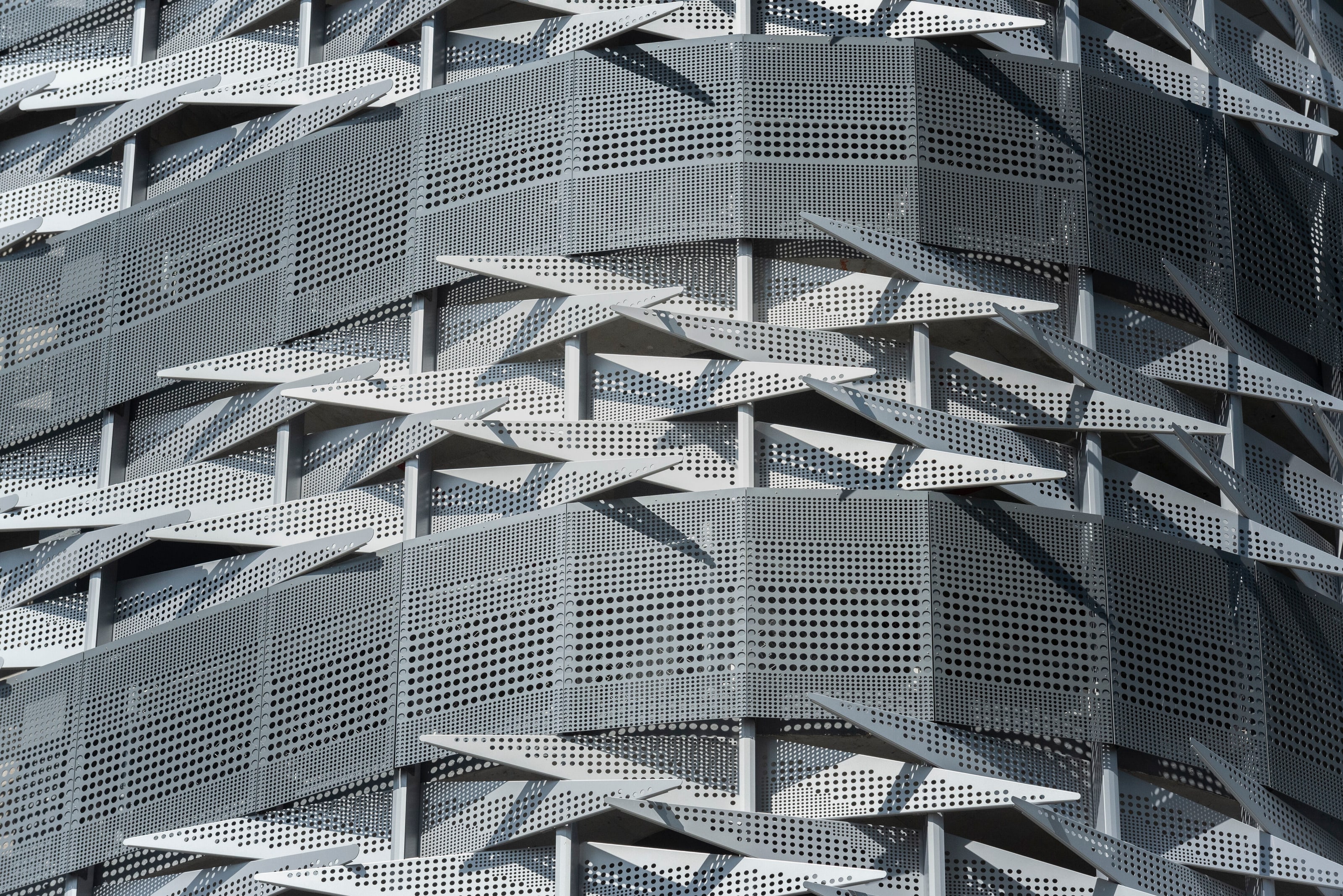 Close-up of Brickell Flatiron's folded perforated metal panels